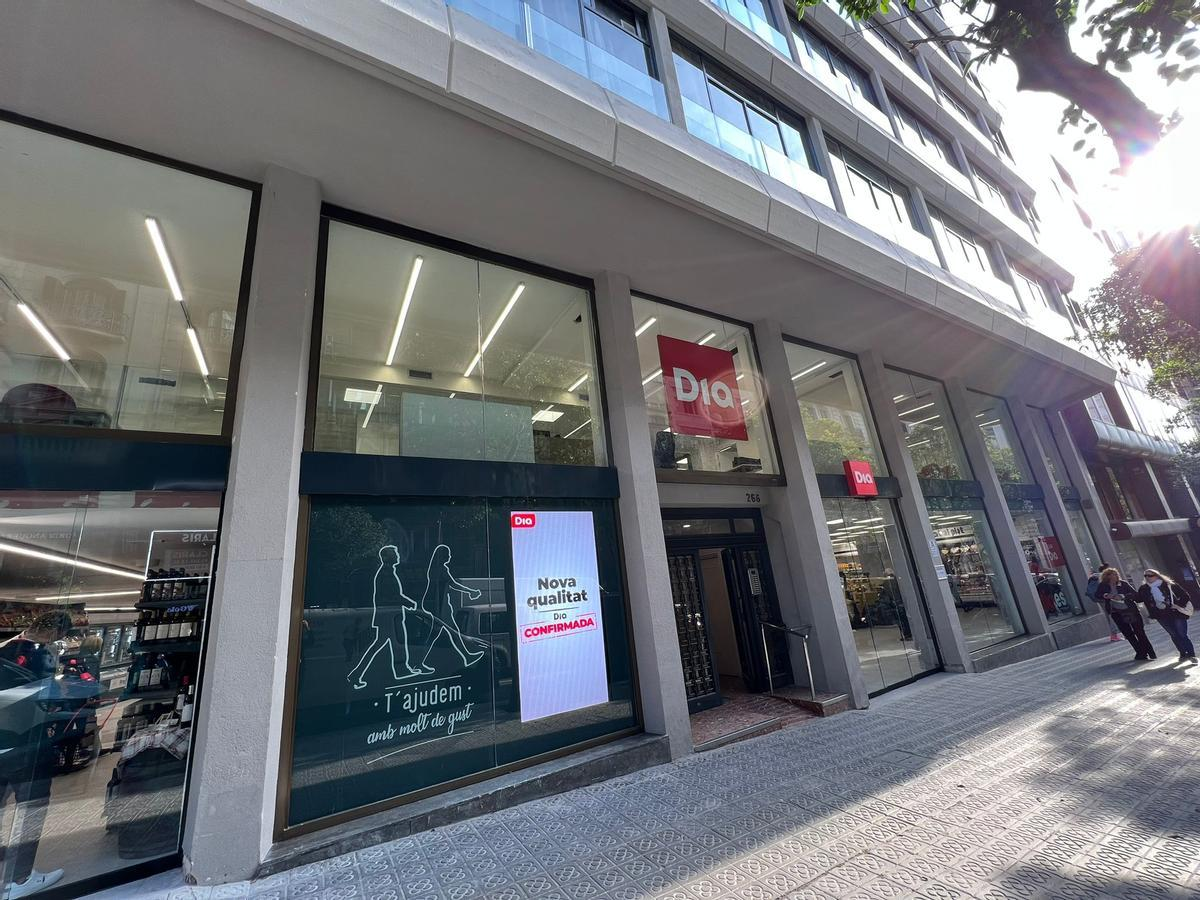 Street view of Dia supermarket in Barcelona with large windows and promotional signage near the entrance.