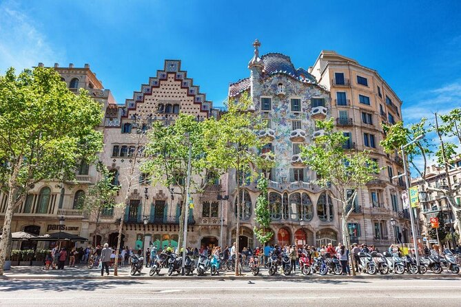 The street passeig de gracia, with clearly the well-known casa batllo in the photo