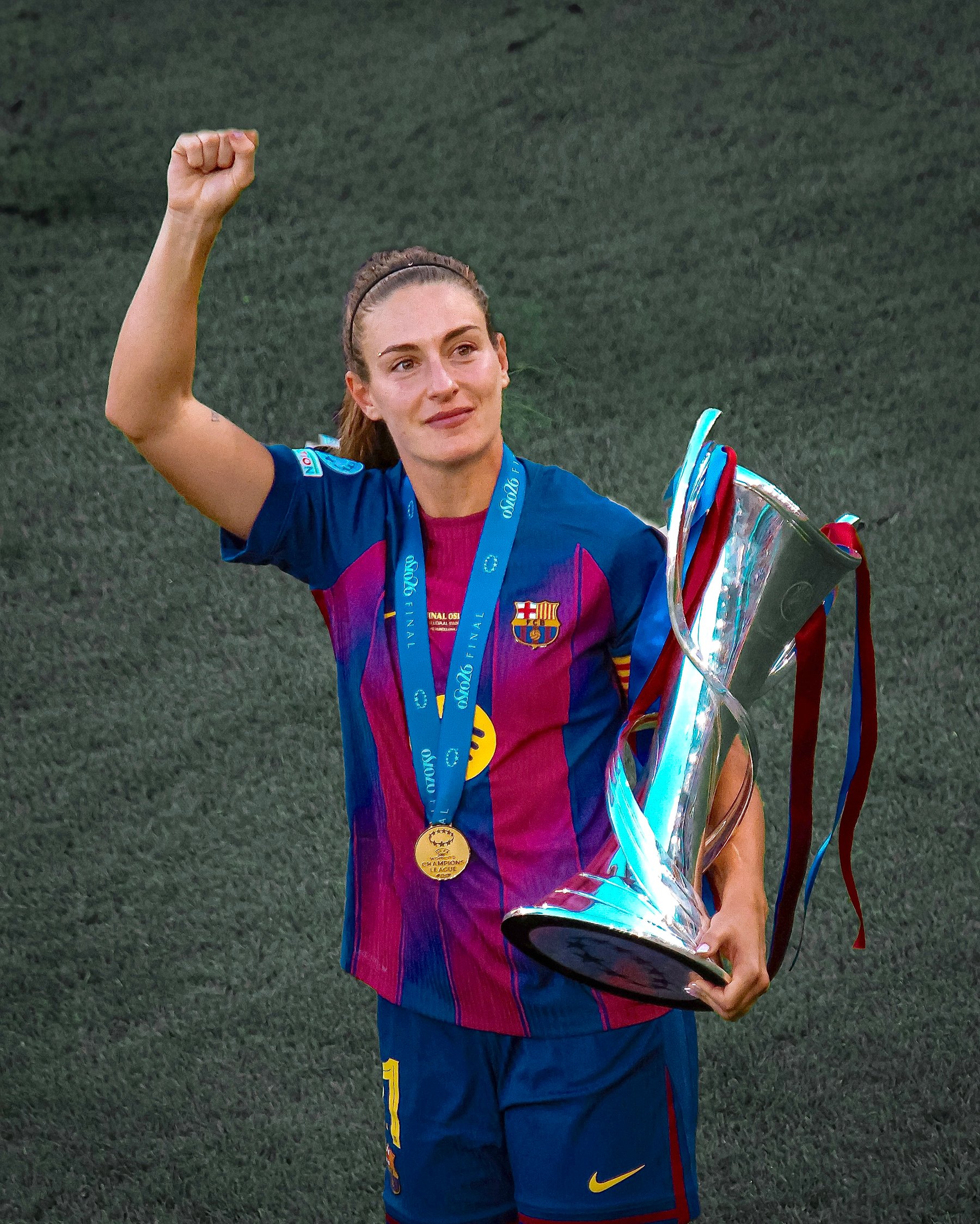 Alexia Putellas holds the UEFA Women's Champions League trophy after Barça's 4-0 win over Lyon in the 2026 final